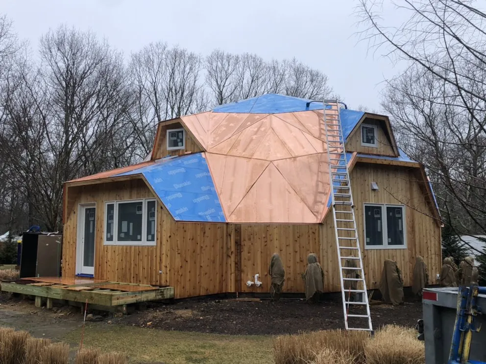 Slide of Hamptons Gutters Corp