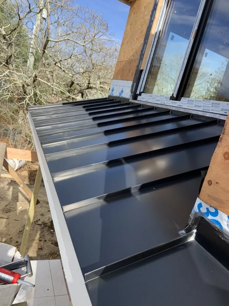 Slide of Hamptons Gutters Corp