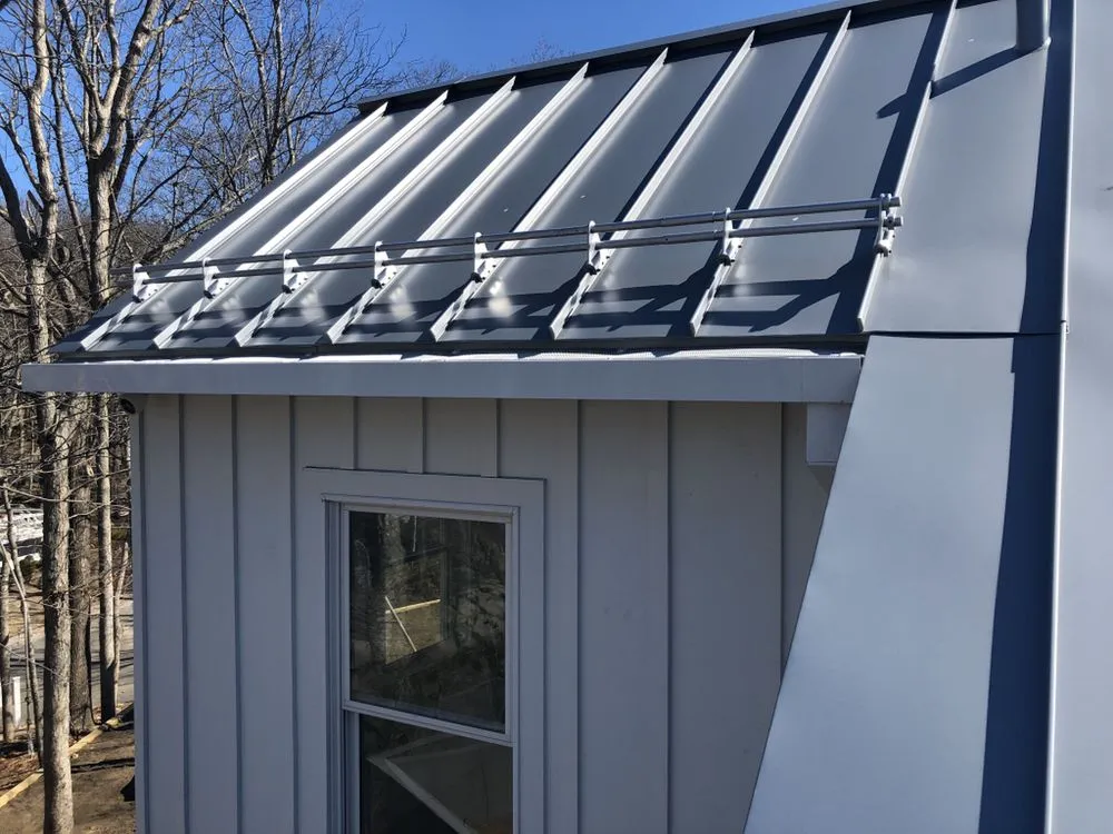 Slide of Hamptons Gutters Corp