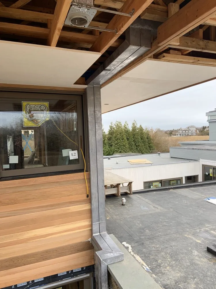 Slide of Hamptons Gutters Corp