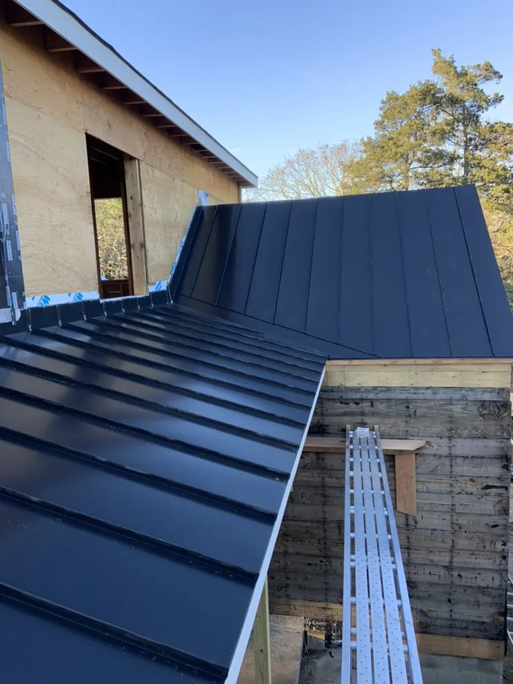 Slide of Hamptons Gutters Corp