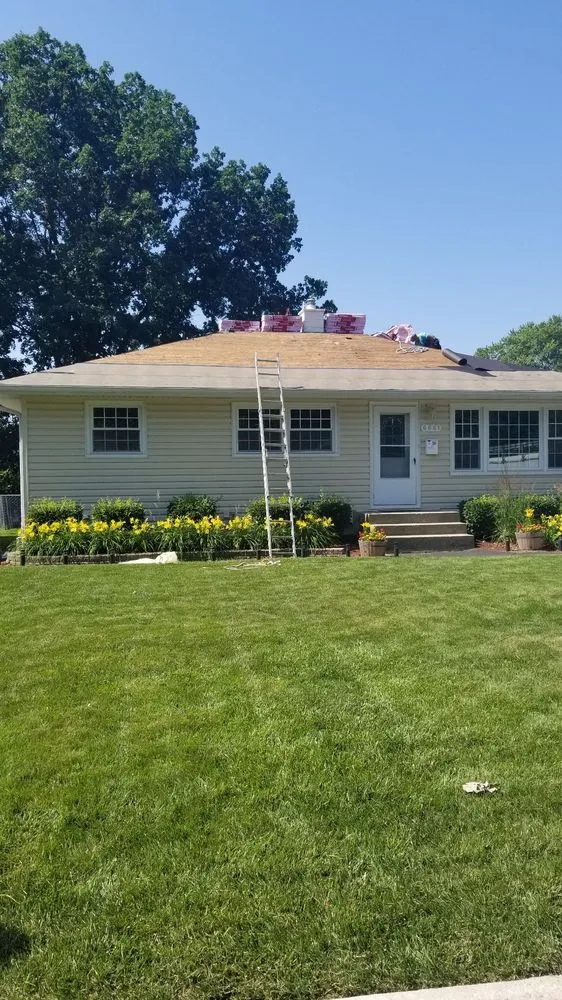 Slide of Hamstra Roofing