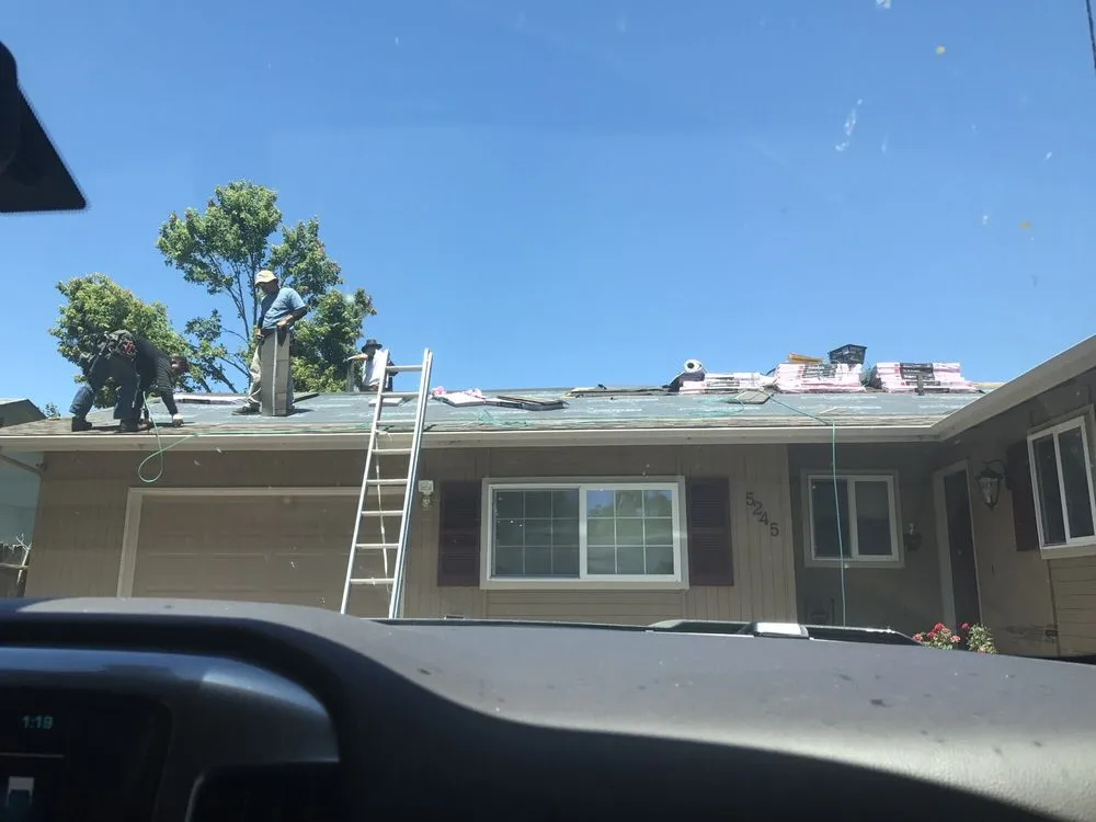 Slide of Handshake Roofing