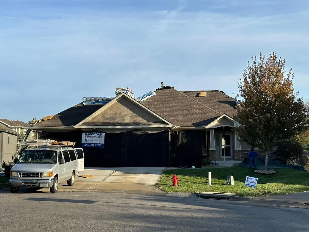 Slide of Happy Dad Roofing