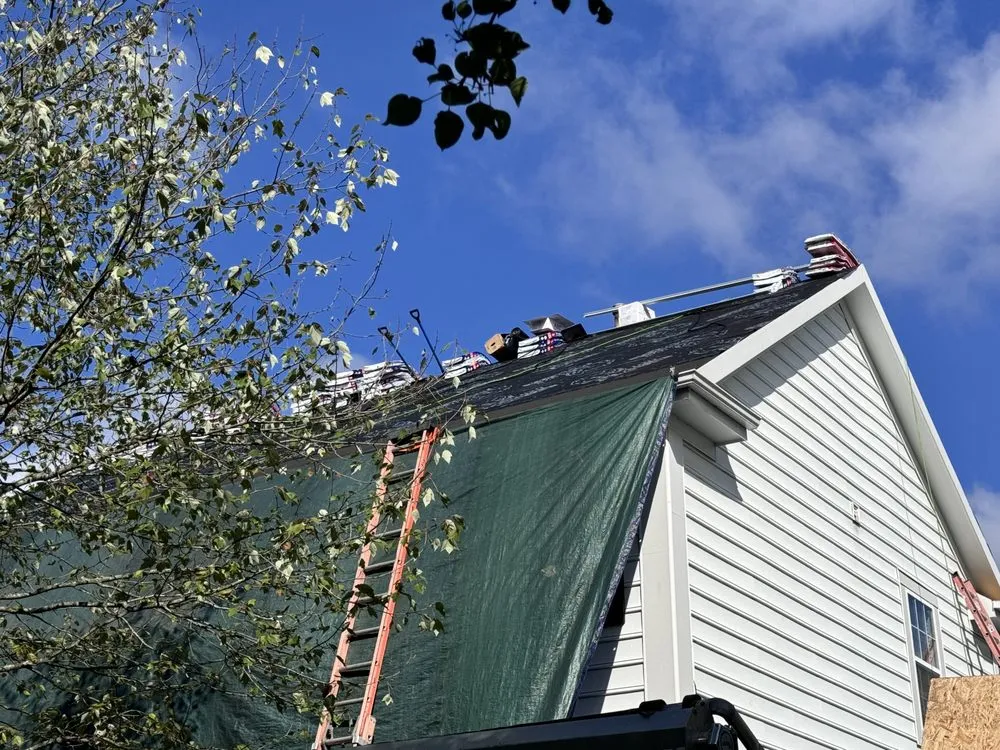 Slide of Happy Dads Roofing
