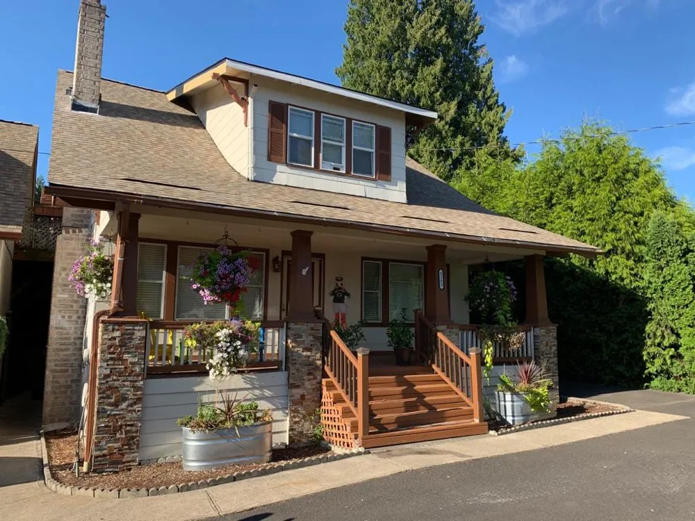 Slide of Happy Valley Roofing