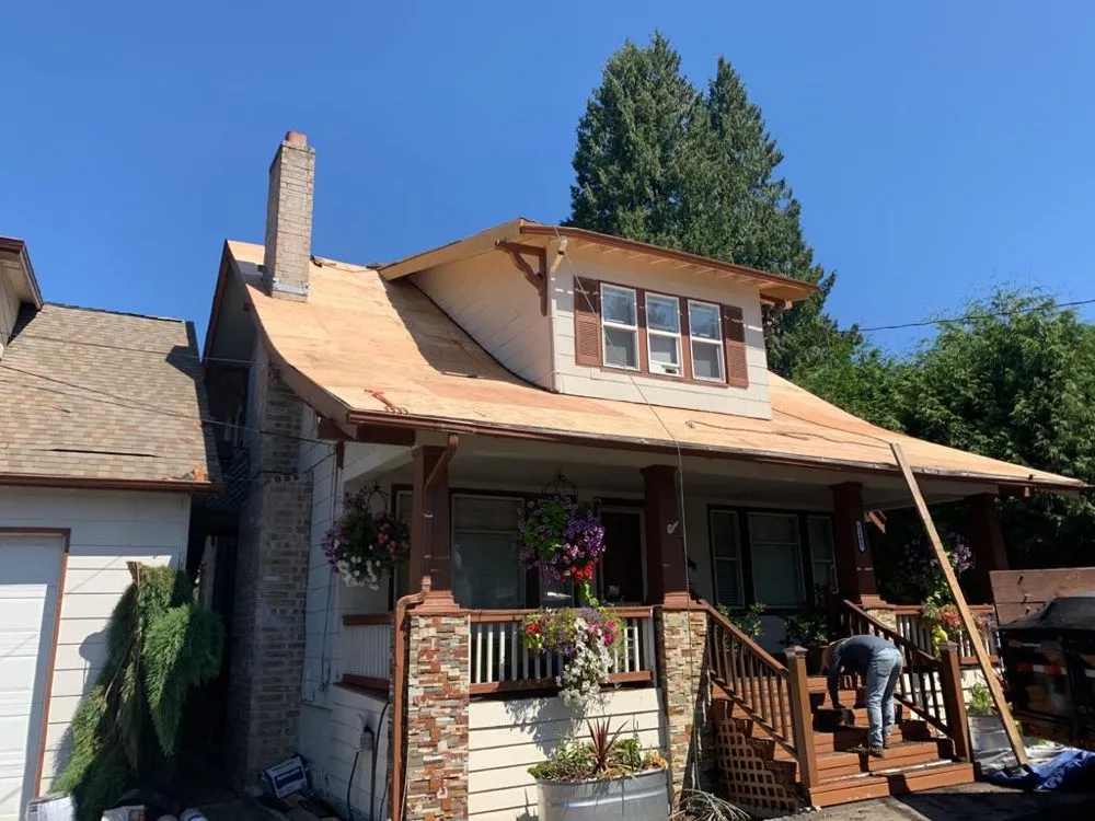 Slide of Happy Valley Roofing