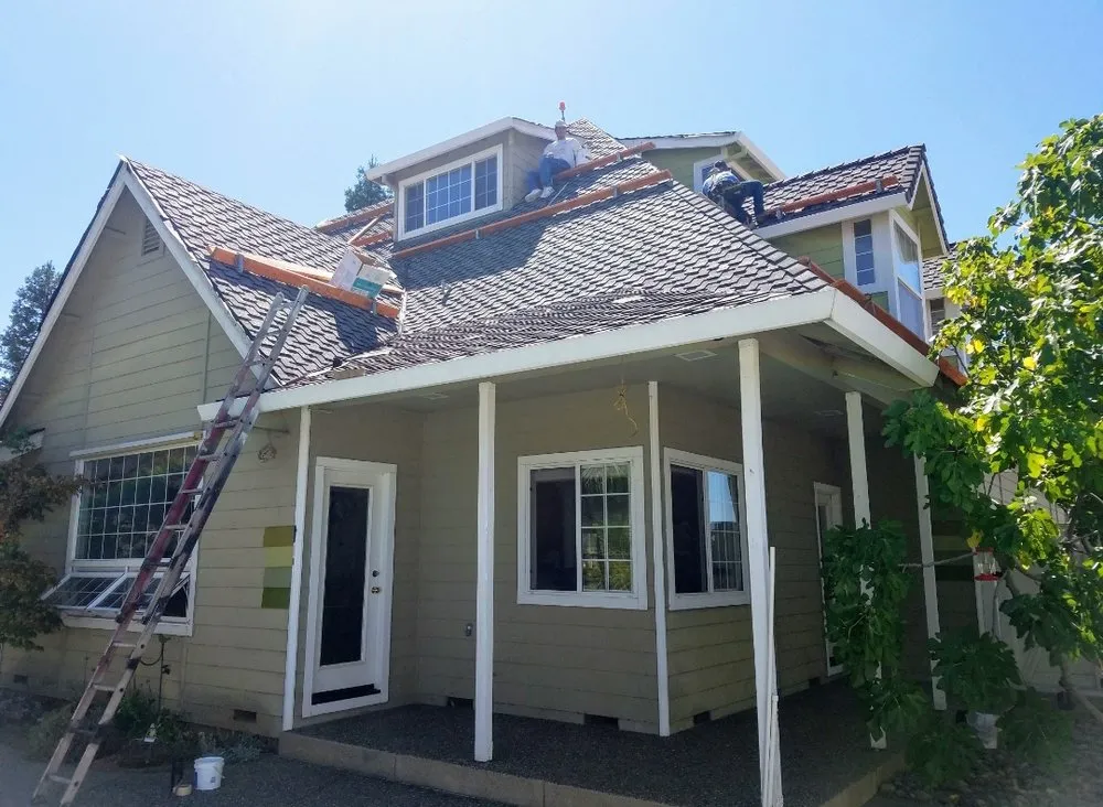 Slide of Harbert Roofing