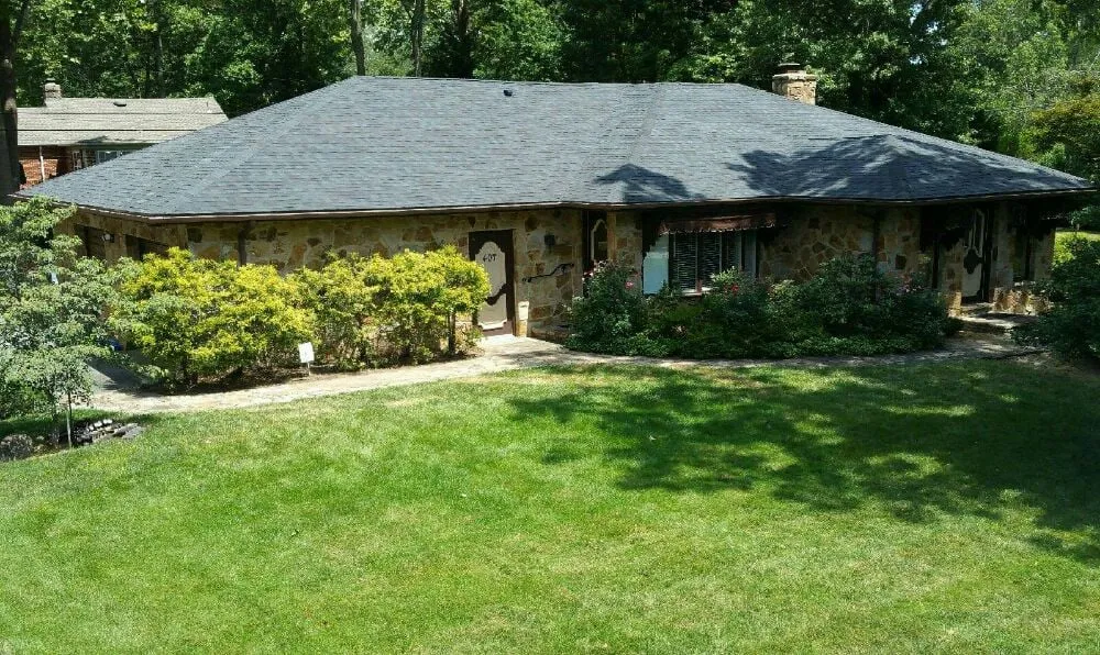 Slide of Hard Hatters Roofing & Construction