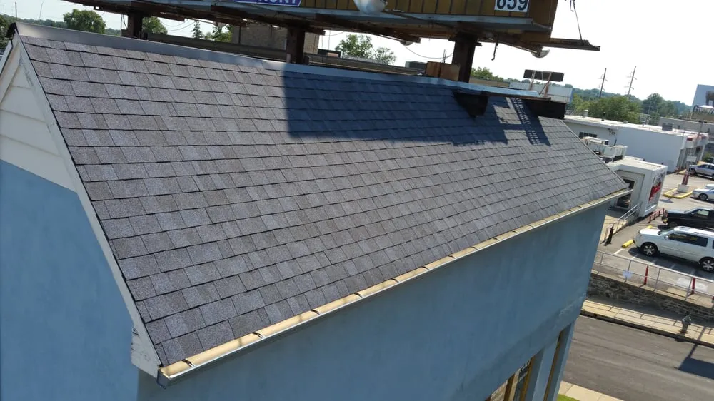 Slide of Hard Hatters Roofing & Construction