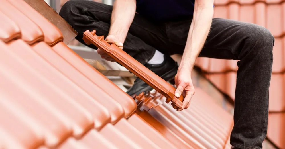 Slide of Hard Rock Roofing