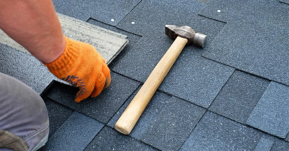 Slide of Hard Rock Roofing