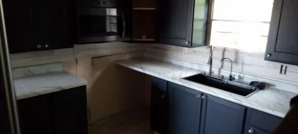 Hardwick Remodeling and Home House Cleaning Crew Logo