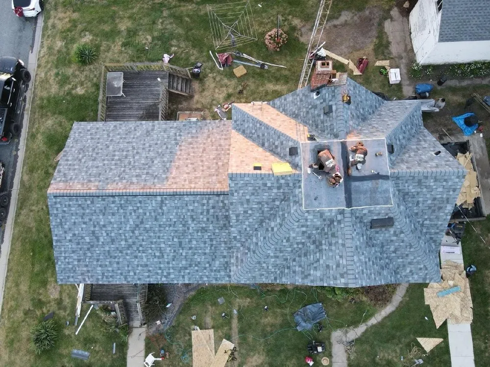 Slide of Hardyman Roofing