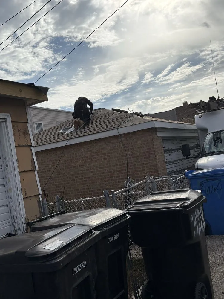 Slide of Harlem Roofing