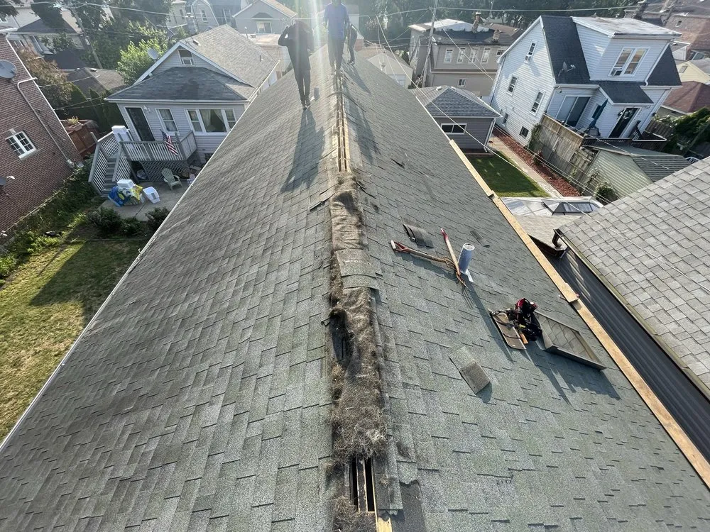 Slide of Harlem Roofing