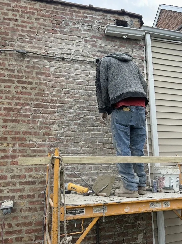 Slide of Harlem Roofing