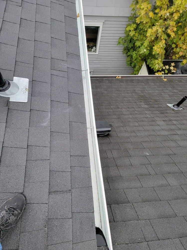 Slide of Harmony Roof and Gutter Maintenance