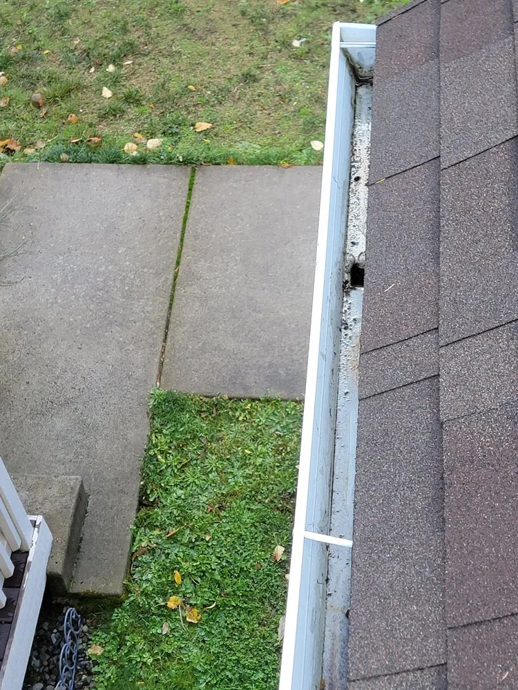 Slide of Harmony Roof and Gutter Maintenance