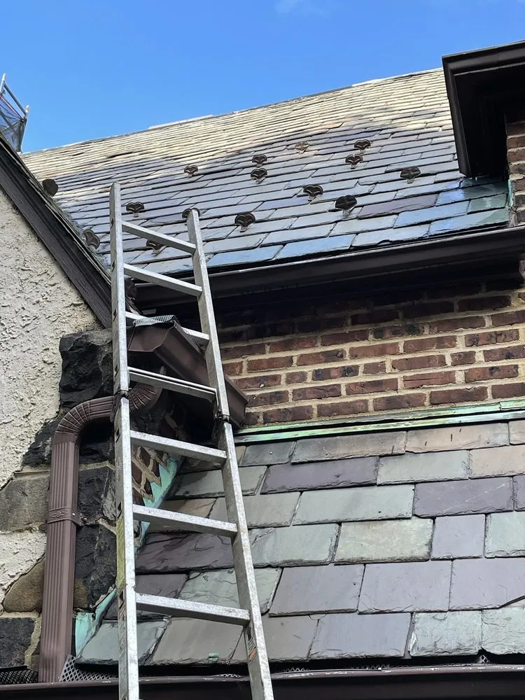 Slide of Harmony Roofing