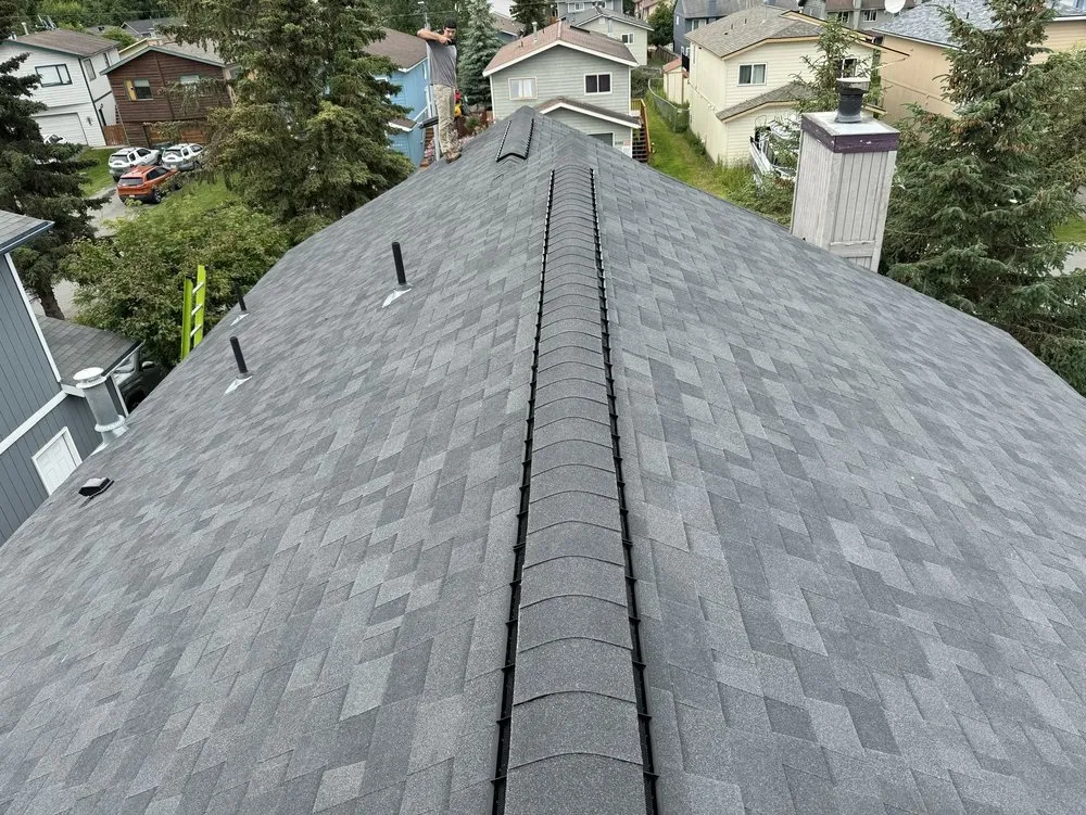 Slide of Harris Roofing