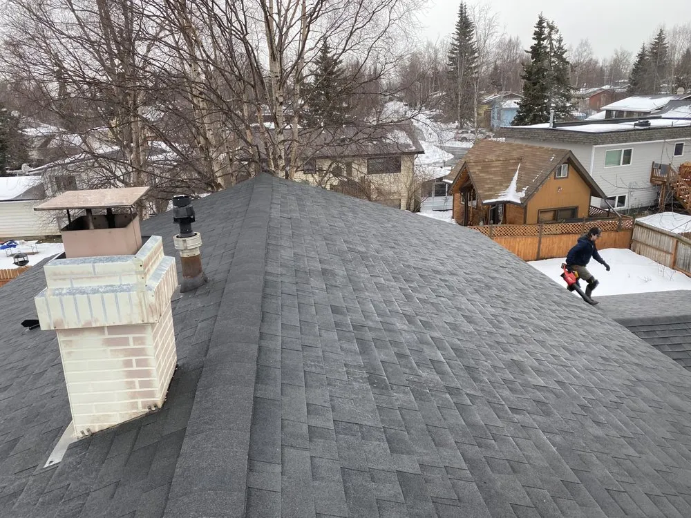 Slide of Harris Roofing