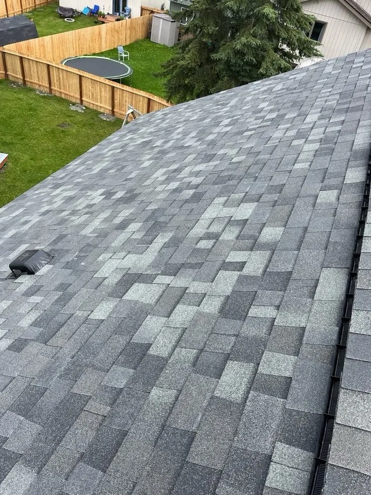 Slide of Harris Roofing