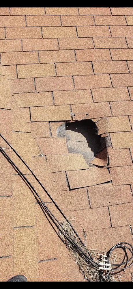 Slide of Harry's Roofing and Construction