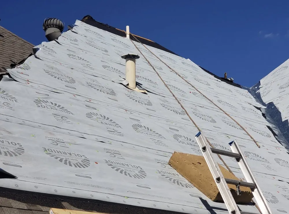 Slide of Harry's Roofing and Construction