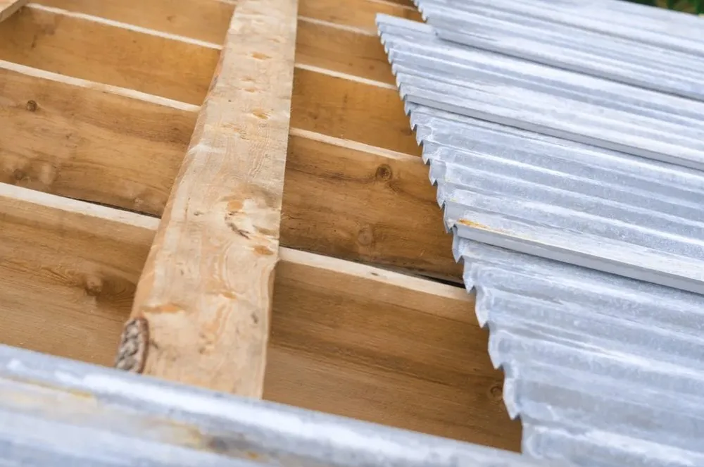 Slide of Harry's Roofing and Construction