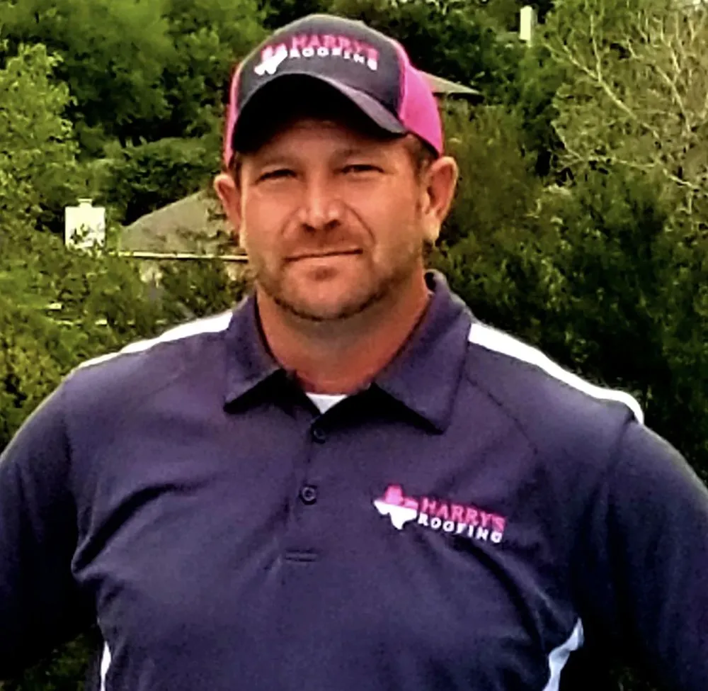 Slide of Harry's Roofing and Construction