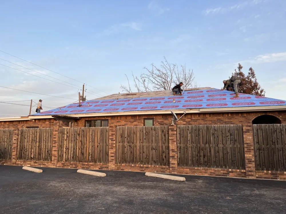 Slide of Hartman Roofing