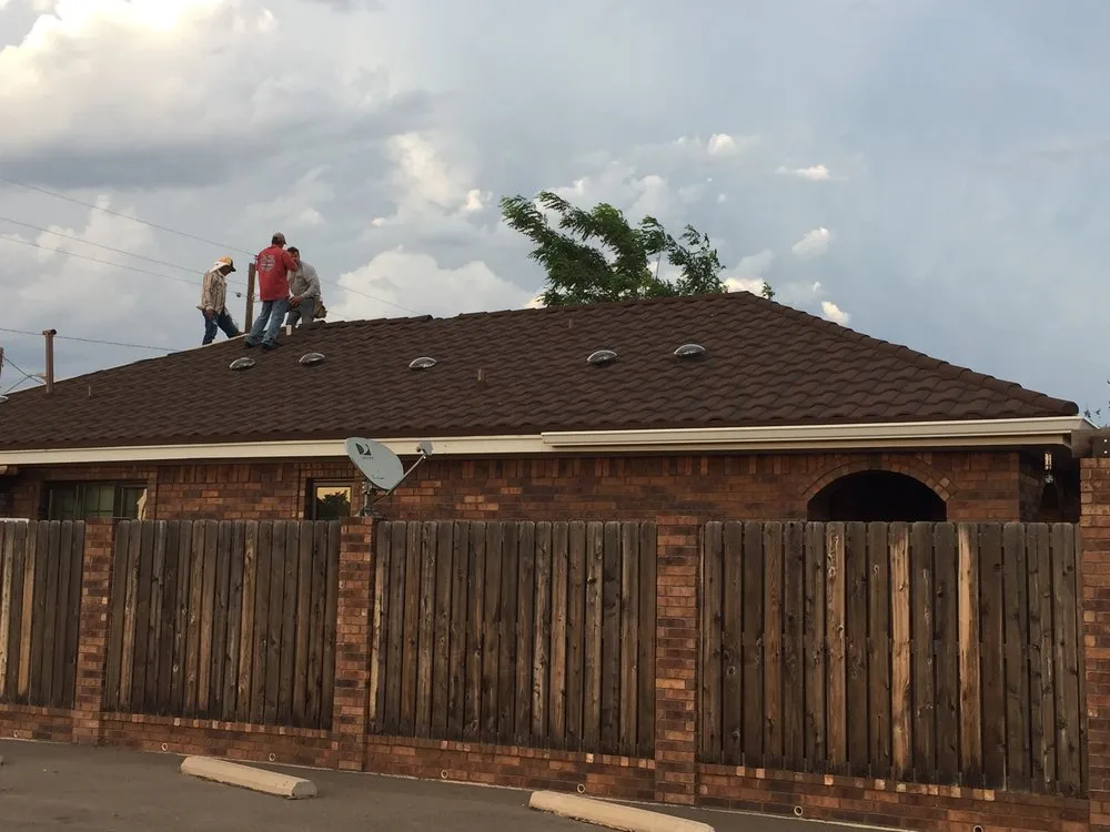 Slide of Hartman Roofing