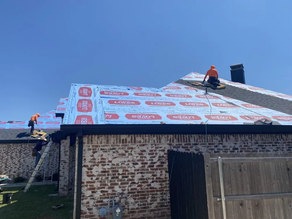 Slide of Hartman Roofing