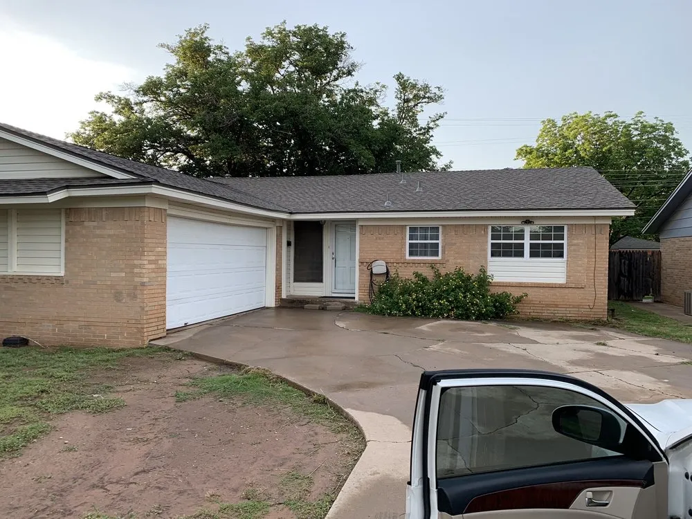 Slide of Hartman Roofing Lubbock
