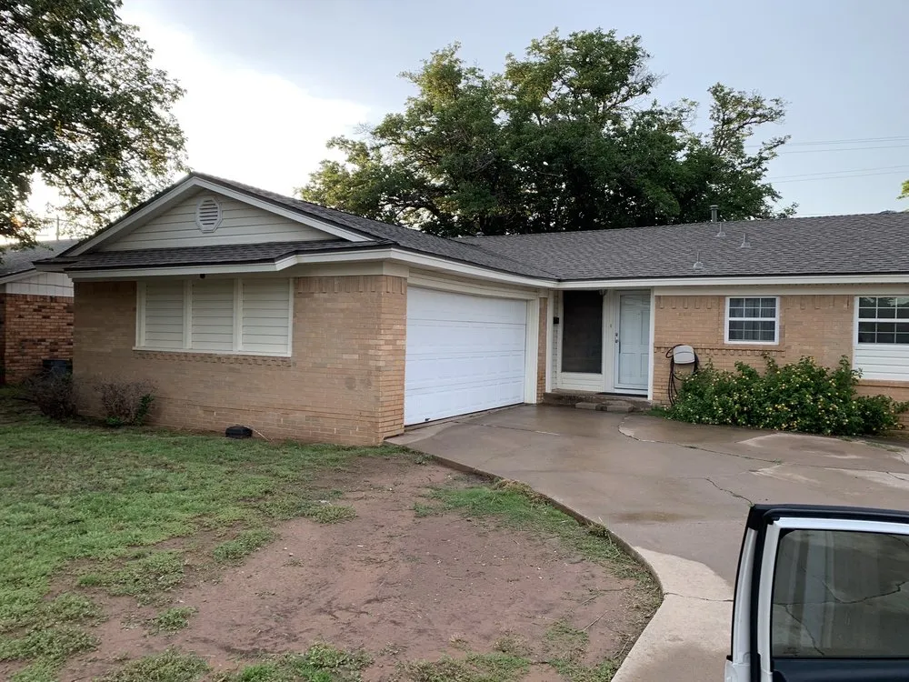 Slide of Hartman Roofing Lubbock