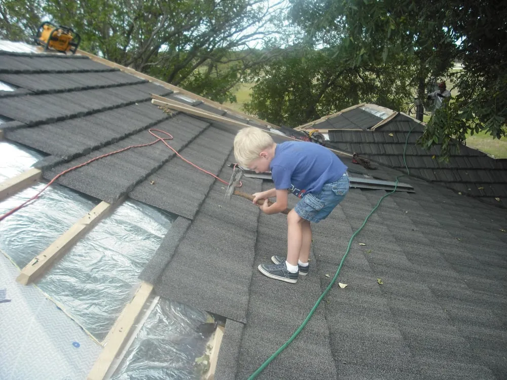Slide of Hartman Roofing