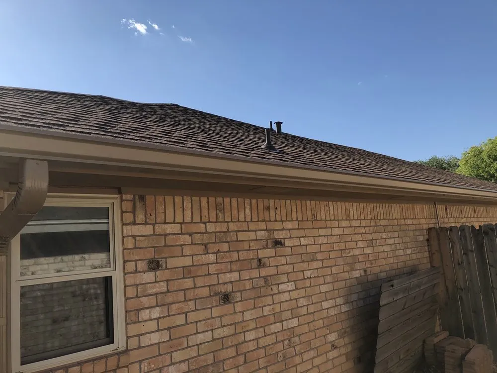 Slide of Hartman Roofing