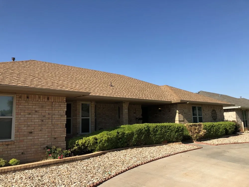 Slide of Hartman Roofing