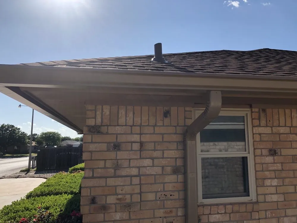 Slide of Hartman Roofing