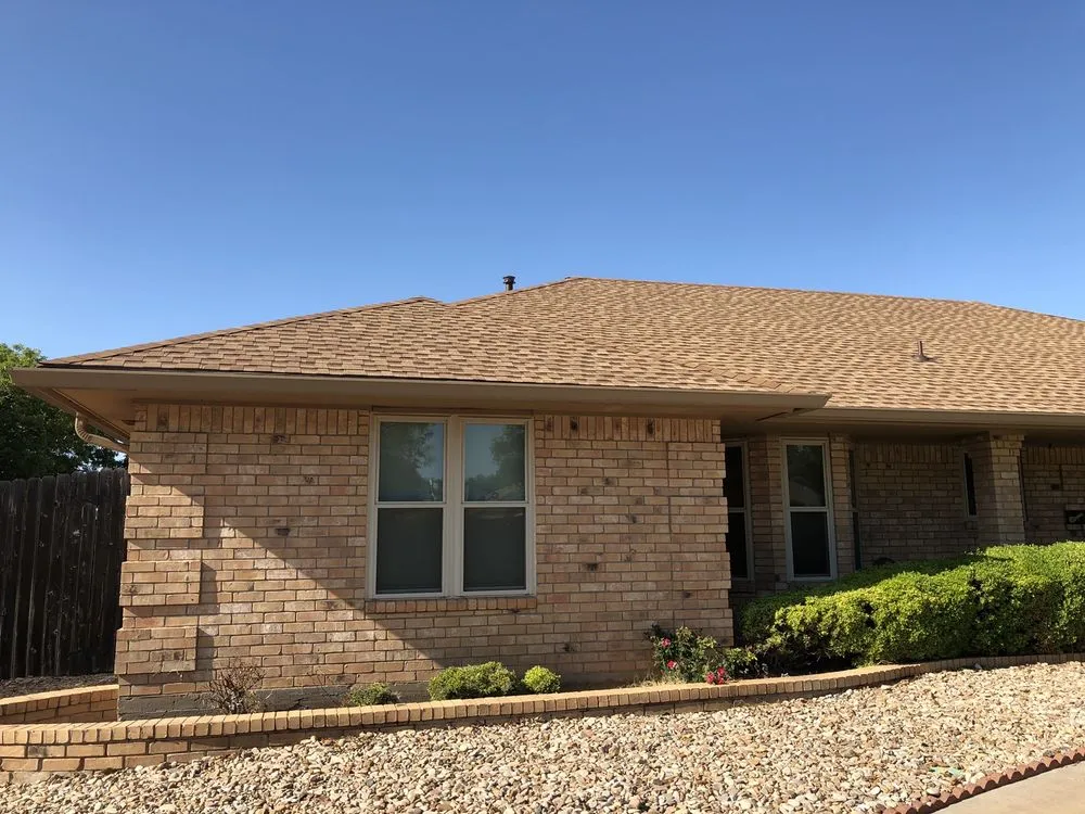 Slide of Hartman Roofing