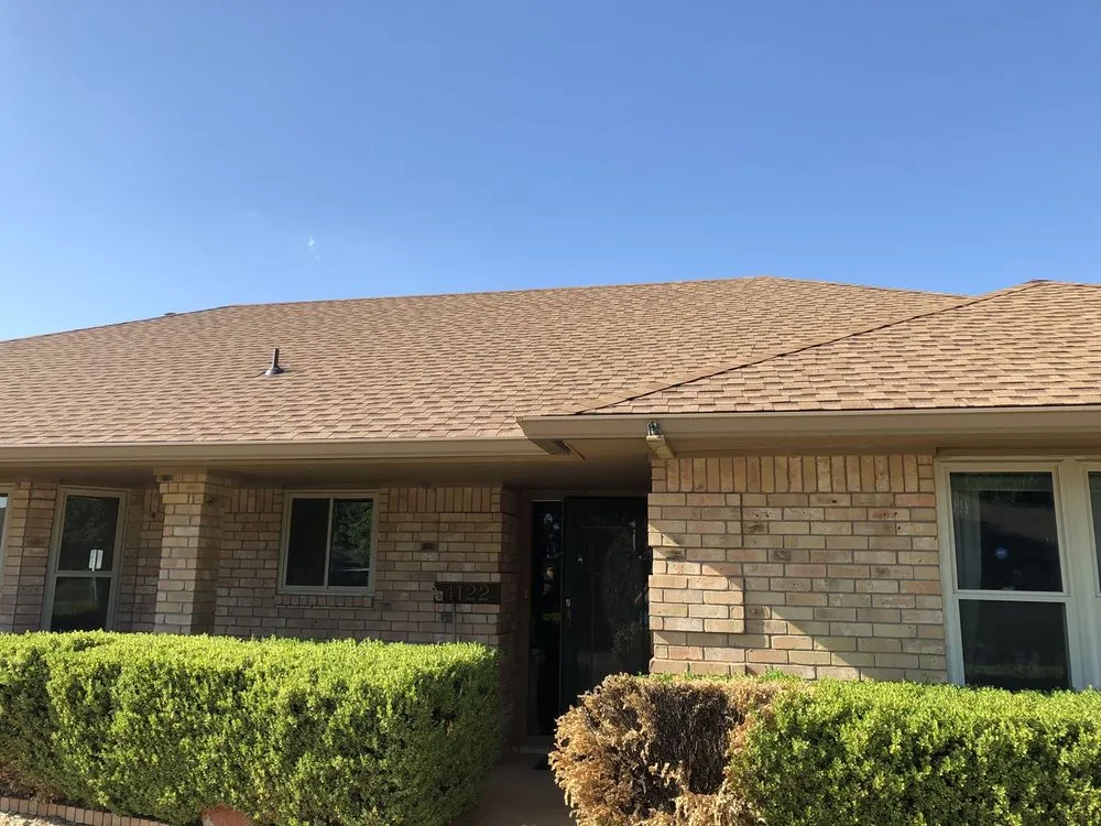 Slide of Hartman Roofing