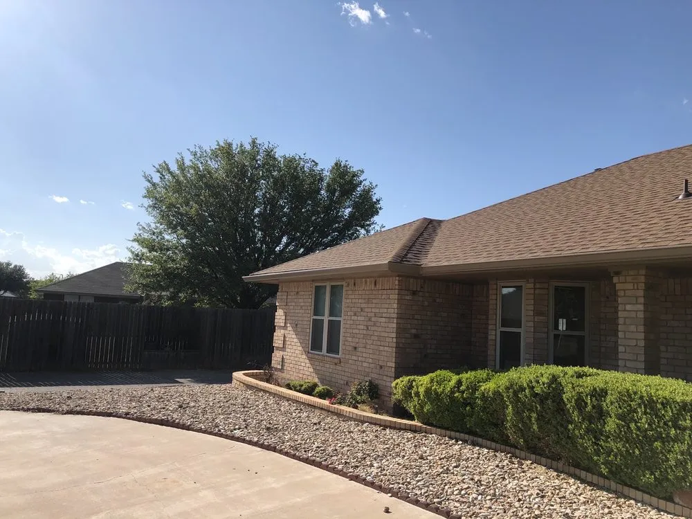 Slide of Hartman Roofing