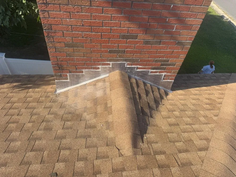 Slide of Harveys Roofing