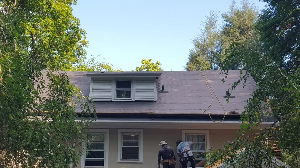 Slide of Hastings Roofing