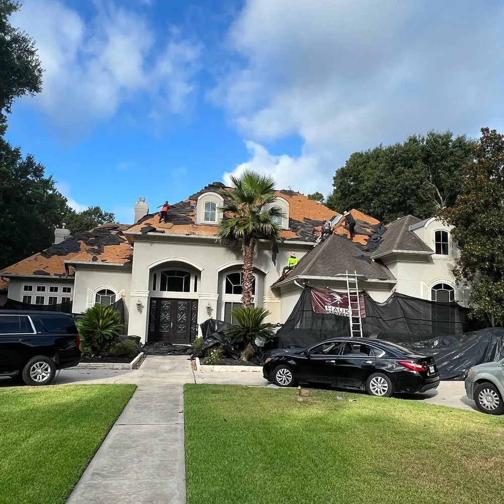 Slide of Hauk Roofing