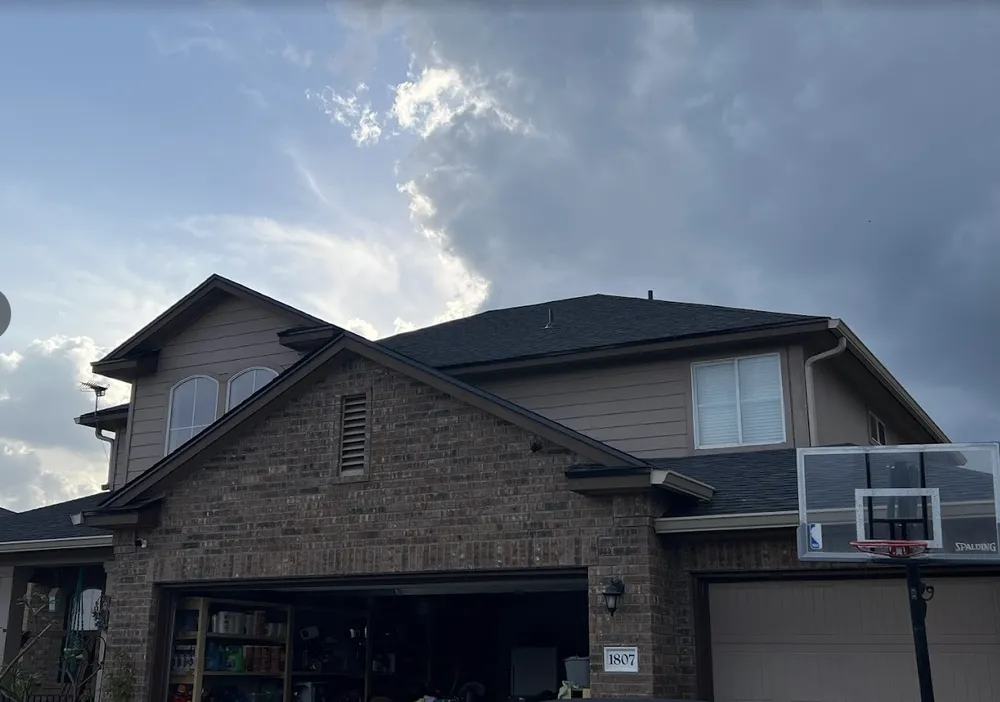 Slide of Havard Roofing