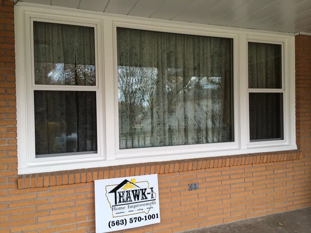 Emergency flat roof repair same-day service in Mccausland, IA by Hawk-I Home Improvement