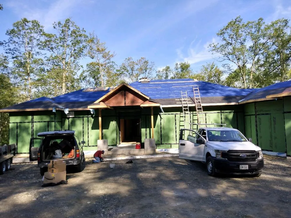 Slide of Hawk Roofing