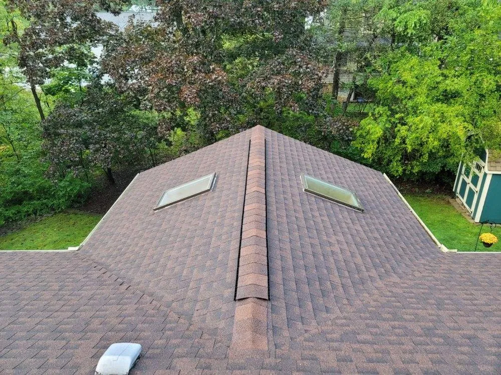 Slide of Hawk Roofing